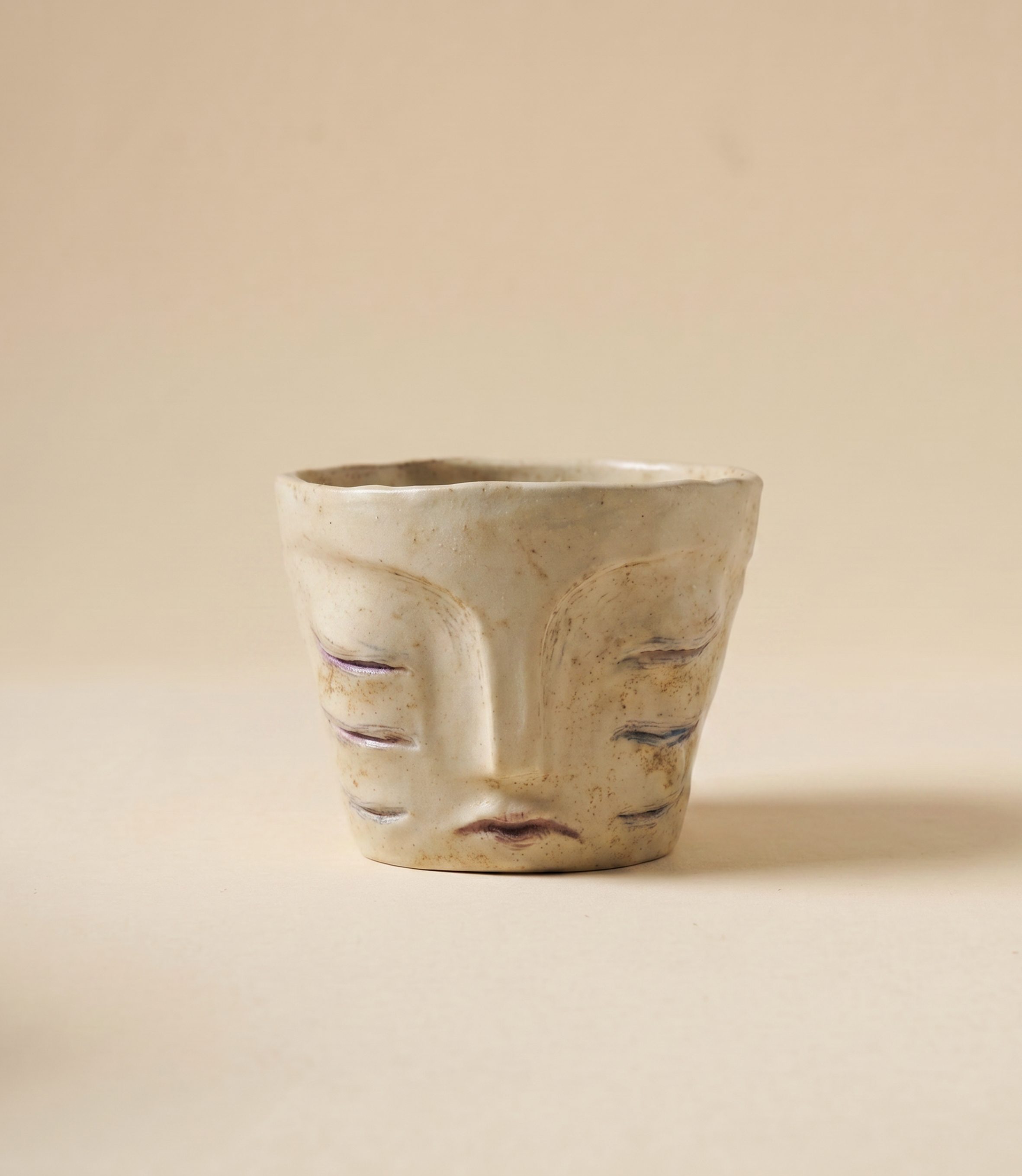 多眼人面杯